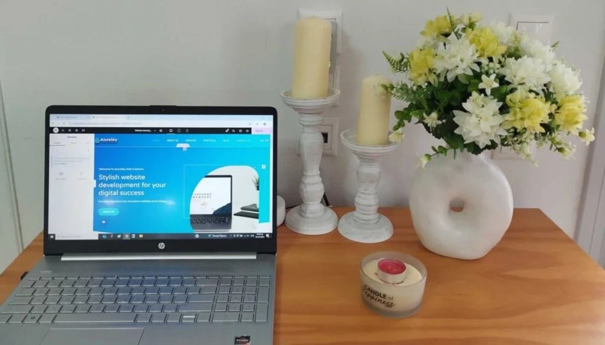 Web development and website design on laptop desk – AzureSky Web Creations